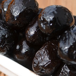 Les olives de L'ombre du palmier séchées et baignées dans l'huile d'olive